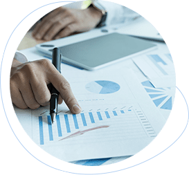 a business person reviewing SEO company reports with graphs