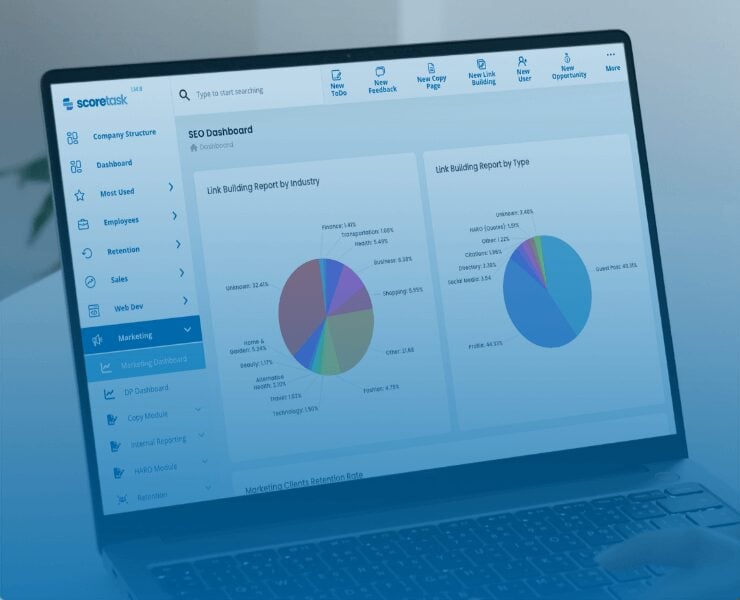laptop showing ScoreTask dashboard